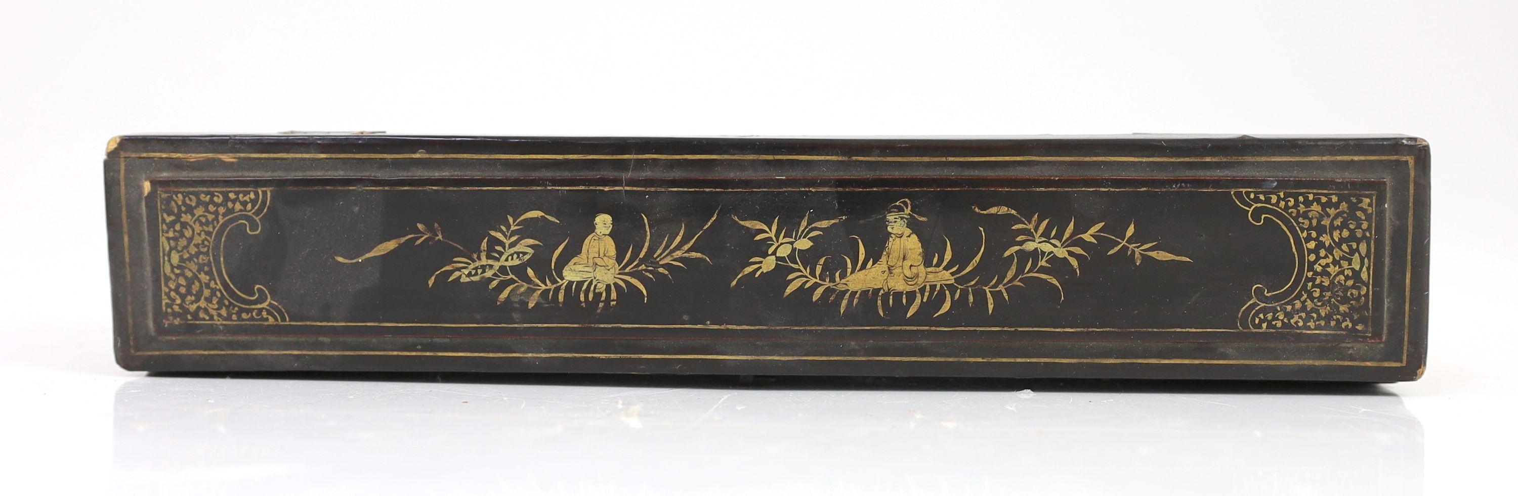 A Chinese lacquer cased sandalwood and lacquer fan, 19th century, 32cm, slight damage